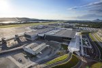 1200px-New_Bergen_Airport_Flesland_with_old_terminal_in_the_background.jpg