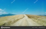 depositphotos_172569316-stock-photo-a-dirt-road-in-the.jpg